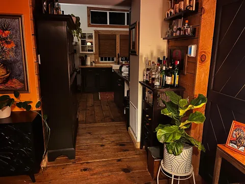 My downstairs living room, kitchen, entry way, music room and bathroom