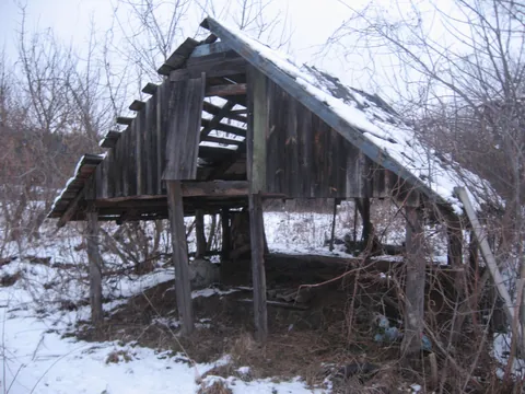 Abandoned barn at my grandparents' estate in rural Ukraine where I spent my summers until we left in 1995