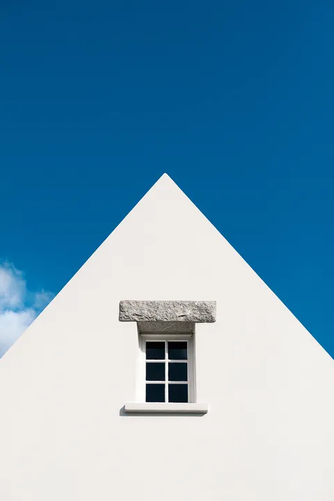 ITAP of a white house against the blue sky