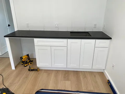 3 year garage/studio apartment build, cost ~$70,000 and one marriage