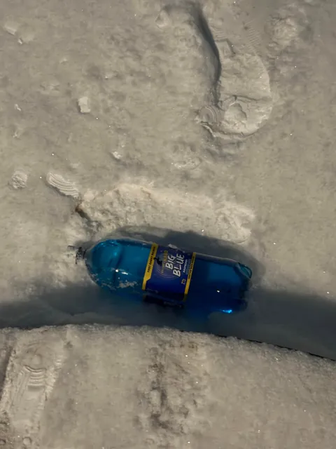 I live alone, someone just tried to enter my house. When looked outside a bottle of booze and sweater were by my car.