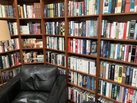 Cozy Reading Nook - just some IKEA bookcases in a corner of our old house.
