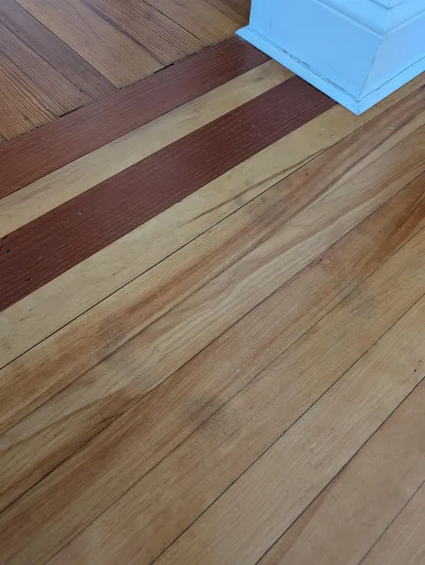 Just moved into a house from 1890 and it has this single set of child footprints marked on the floor that won't wipe away