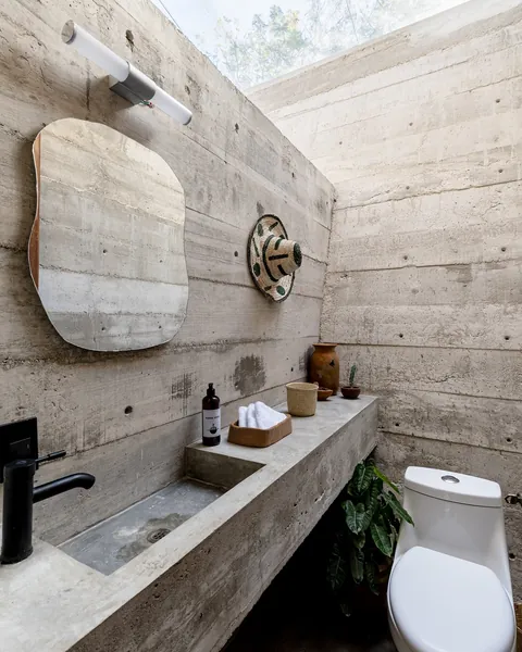 Casa Hezbo by French architect Ludwig Godefroy embraces a bold Brutalist aesthetic while blending indoor-outdoor living in Puerto Escondido.