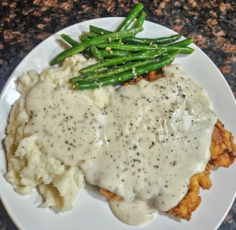 [homemade] Chicken fried chicken, mashed potatoes, and green beans.
