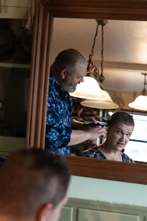 Shaving my head after week one of chemo