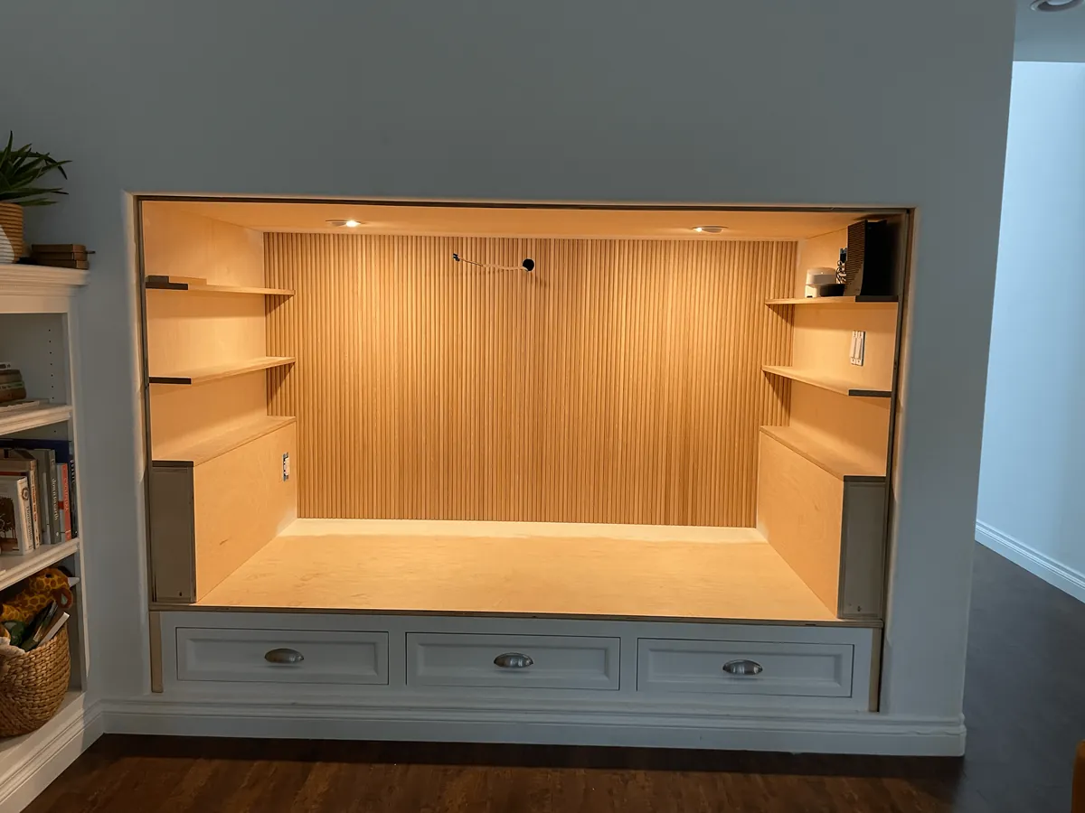 We transformed our 90s entertainment center in a reading nook