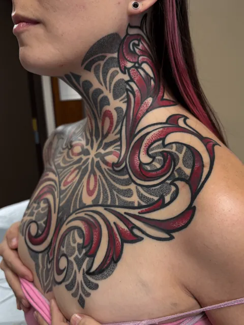 Healed neck/chest piece!! Tattoos by Jess Ward in Portland, OR