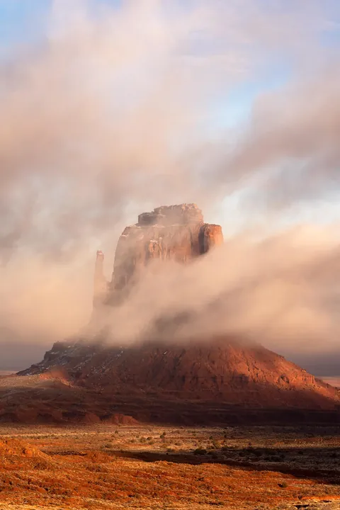Clouds and Light in Monument Valley [1667x2500] [OC]