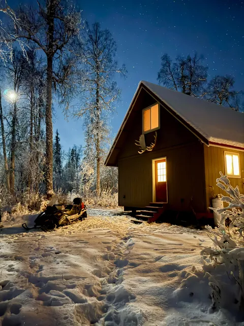 Night lasts 18 hours this time of year, but the cabin is so cozy I don’t mind