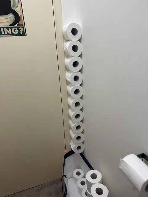 While taking a dump I realised the gap between the door frame and the wall perfectly holds toilet roles