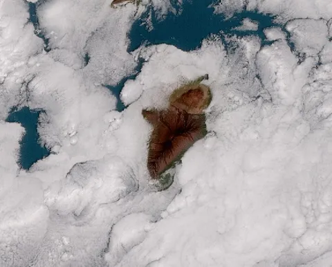 NOAA’s GOES-17 satellite imaged billowing clouds that formed around Hawaii’s Big Island on January 15, 2019.