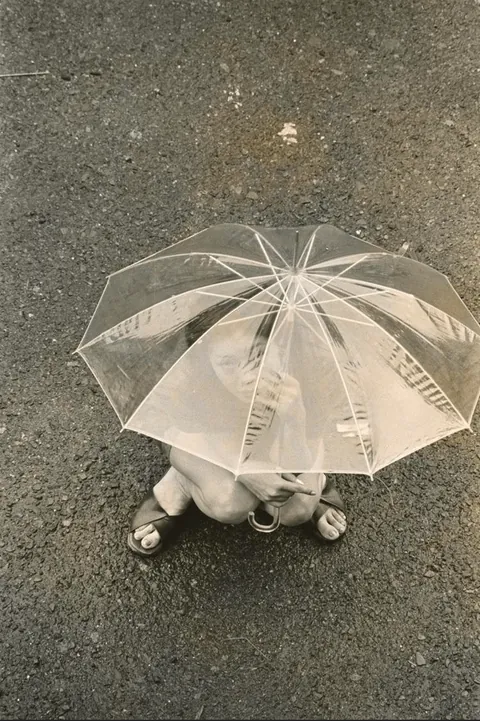 Masahisa Fukase photographed his wife, Yōko Wanibe, every morning from the window of their apartment in Tokyo as she left for work.