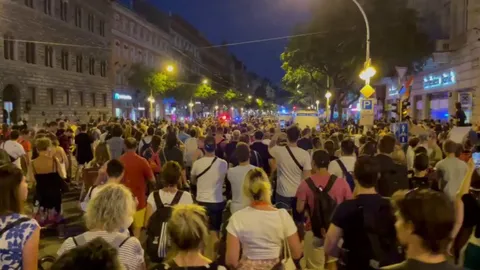 Thousands of people storm the streets of Budapest after Orban breaks several of his campaign promises merely 100 days after being re-elected