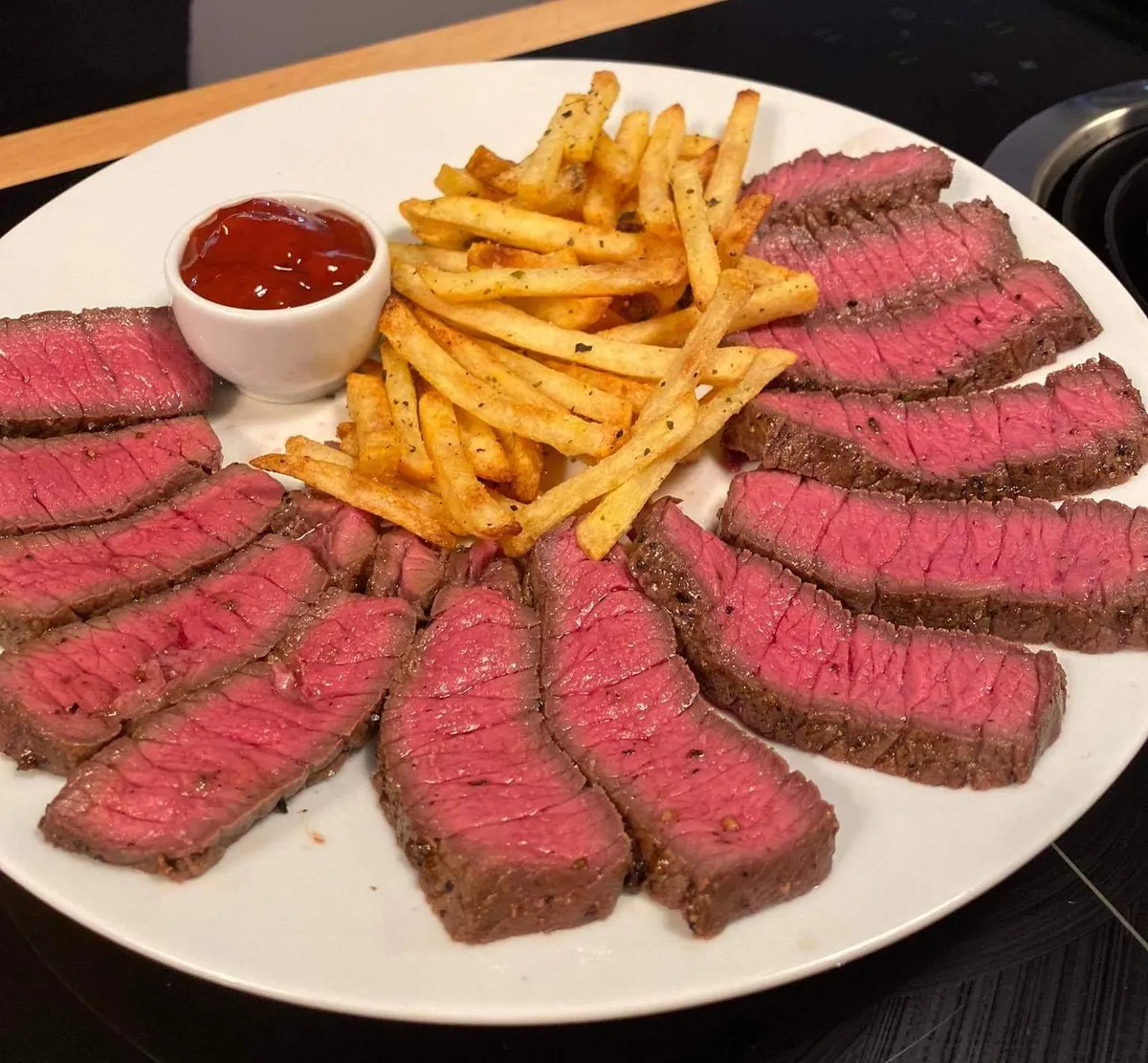[Homemade] Medium-rare sirloin with baked french fries.