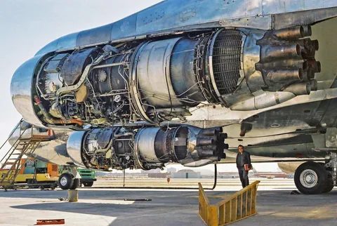 An unimpeded view of a Boeing 707's port side engines, each equipped with stage 3 hush kits