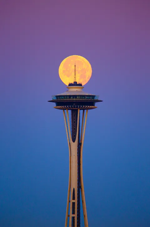 I Woke Up at 4AM Today to Capture the Buck Moon Balanced on the Space Needle During Twilight Hour.