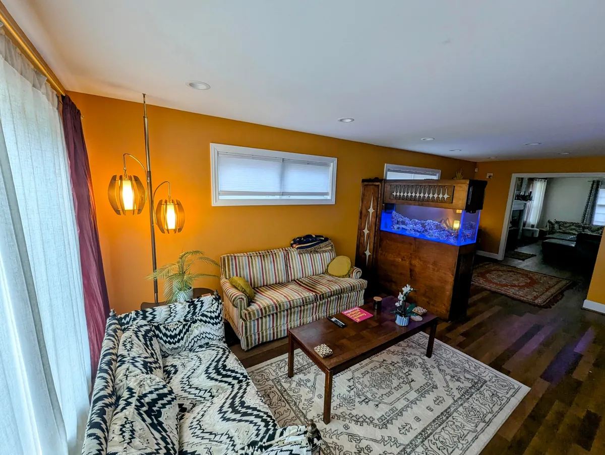 Mid Century-inspired room divider aquarium stand