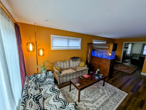 Mid Century-inspired room divider aquarium stand