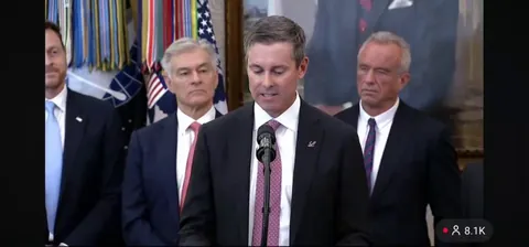 To go down with a smile in front of dear leader.