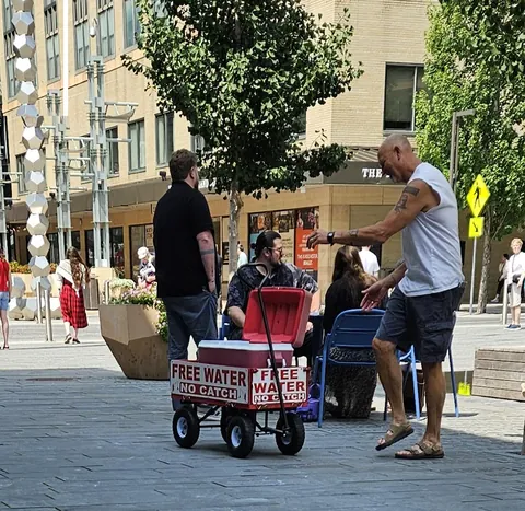 This guy walks around Mayo Clinic in downtown Rochester, MN, giving bottles of water to whoever needs one.