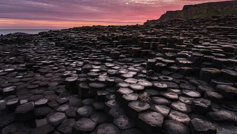 Sunrise at the Giant’s Causeway, Ireland [OC] [15694x8828]