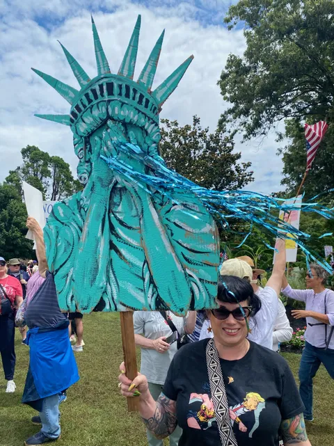 A perfectly executed sign seen at a No Kings protest in Memphis, TN 🍊💩
