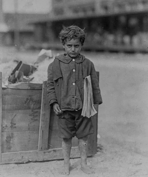One of America’s youngest newsboys (4 years old) Florida, 1913.