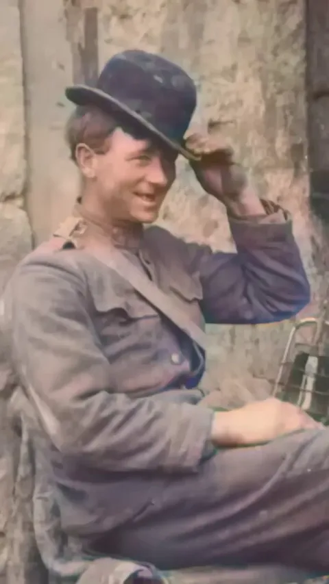 Restored footage from 1918 shows soldier James R. Beach having the time of his life goofing around with a hat in France