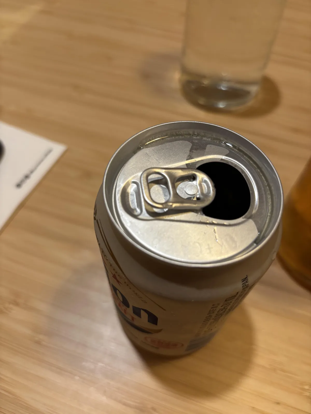 This can of Japanese beer has a little divot where your thumb goes so you don’t have to wreck your thumbnail to open it
