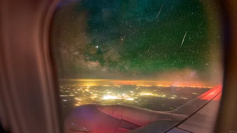 The Milky Way and a Meteor shower from my window seat on a Boeing 737