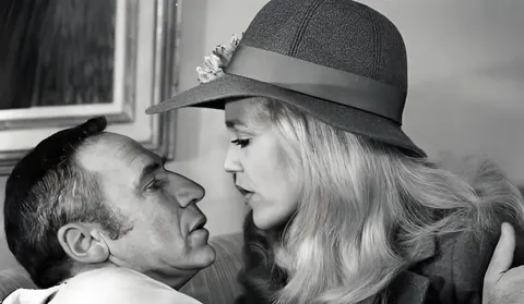 The incomparable, Madeline Kahn with, Mel Brooks, who despite not having conventional leading man stature and looks, always ended up in the arms of the most beautiful women in the world. 1977.