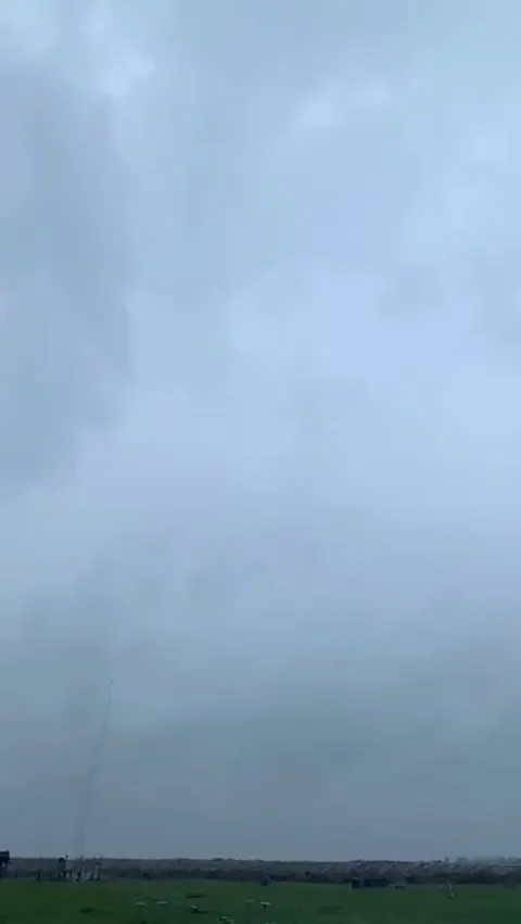 Lightning Bolt Is Guided To Ground Through Rocket Trail