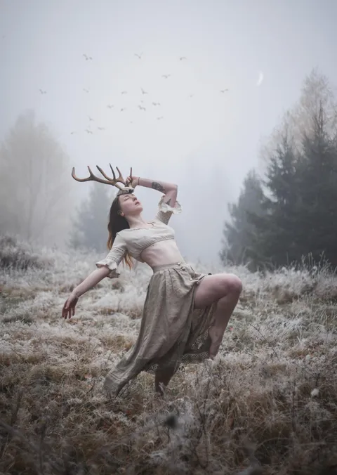 ITAP of myself holding deer antlers [Portrait]