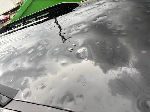 A storm with egg sized hail wrecked my car while at work