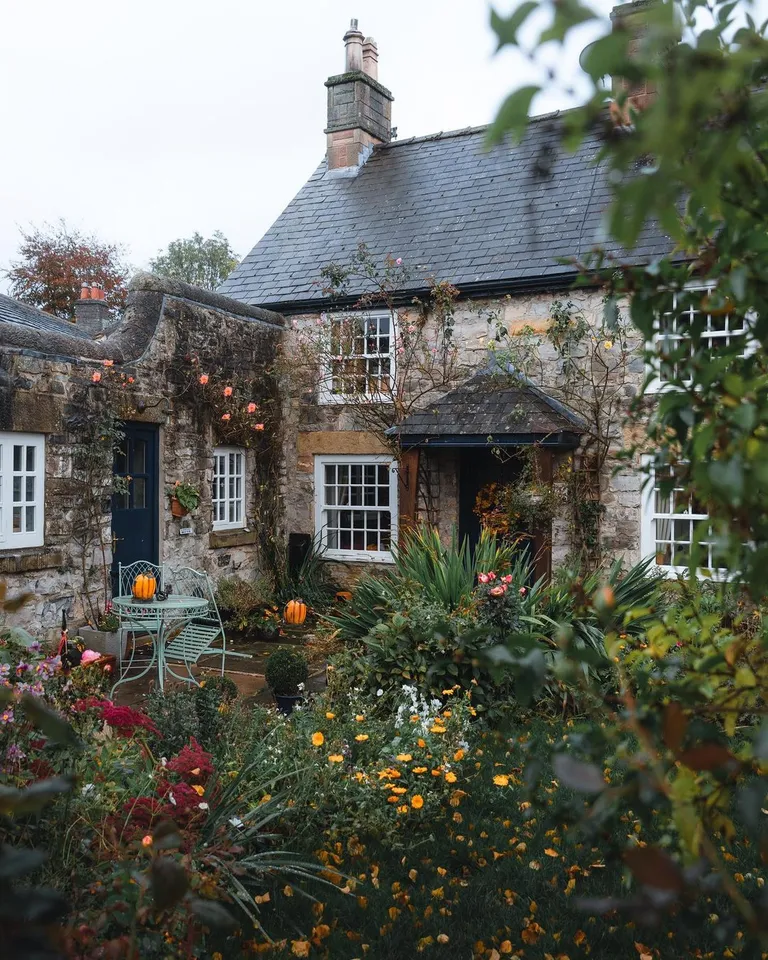 Cottage garden in a rainy day, Ashford-in-the-Water, England.