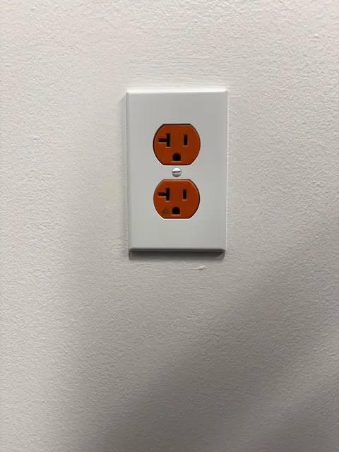The outlets in my office are orange.