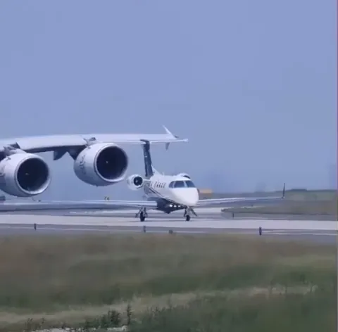 A380 Taxiing Behind a Private Jet
