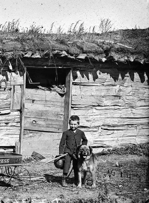 A young boy and his dog from 1889.