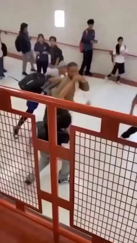 Teacher fights student for repeatedly calling him the 'n-word' in the school hallway