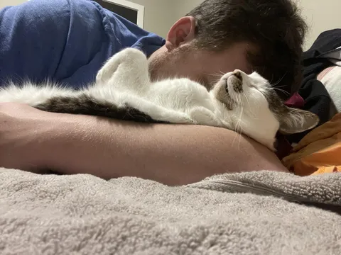 Me with the cat I didn’t want initially 