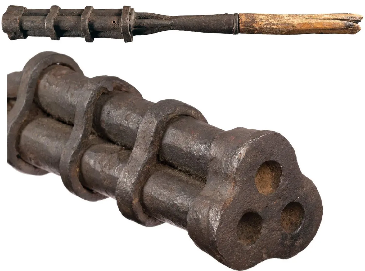 Old model of a multi shot hand gun from Asia. 3 barrels made of iron, circa 1600s source in comment