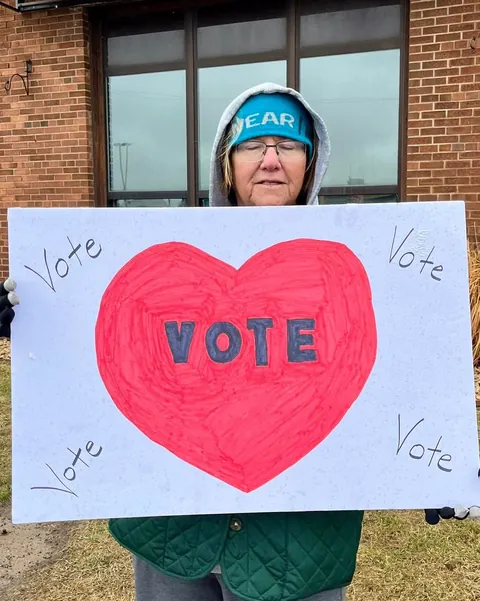 Demonstrators in deep red Barron County, WI remind people of tomorrow's Supreme Court election. [OC]