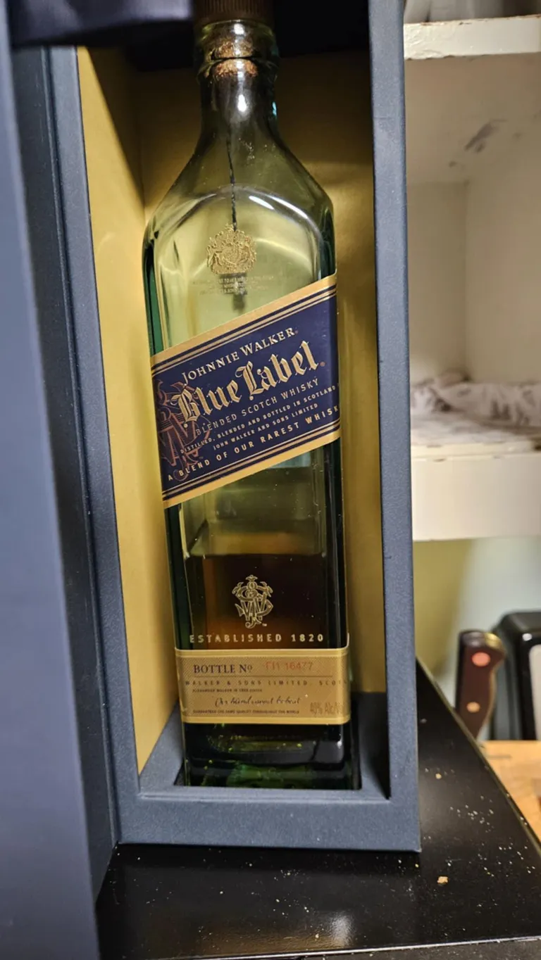My old man annihilated a $400 bottle of Blue Label I kept stashed away.