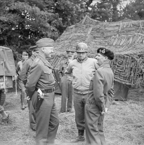 Allied Generals Patton, Bradley, and Montgomery having a laugh at 21st Army Group HQ in Normandy - 7 July 1944