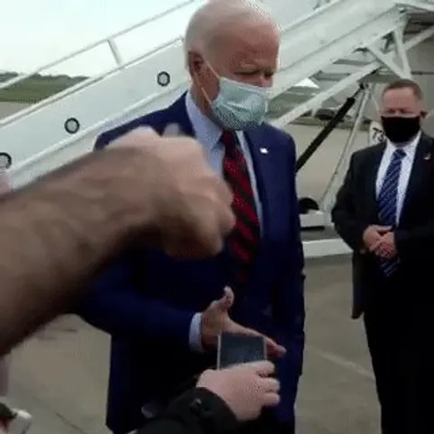 Jill Biden pulls her husband back a few feet