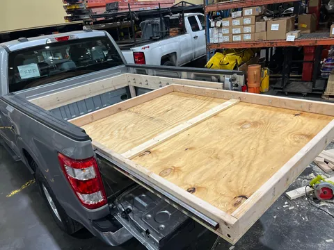 I built a custom bed slider for my new work truck.