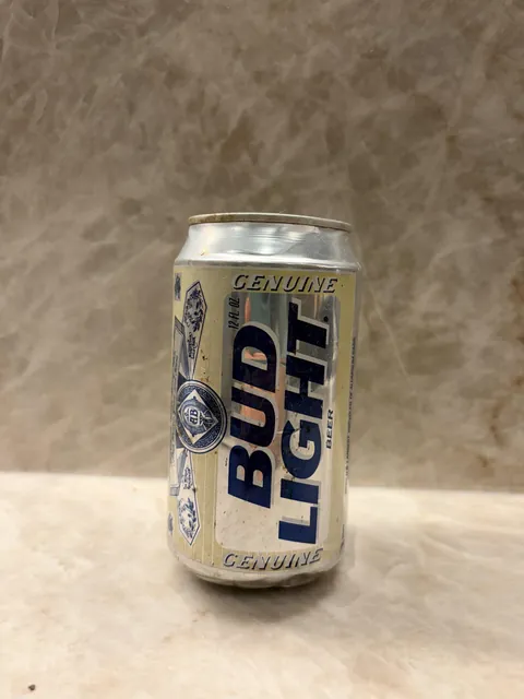 Found a unopened 25-30 year old Bud Light while picking up trash in the woods behind my house.