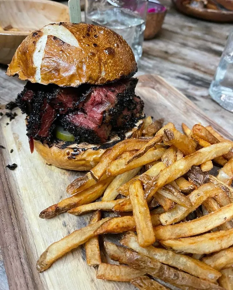 Pastrami Sandwich and Fries. Credit: Main House Kosher BBQ and Bar