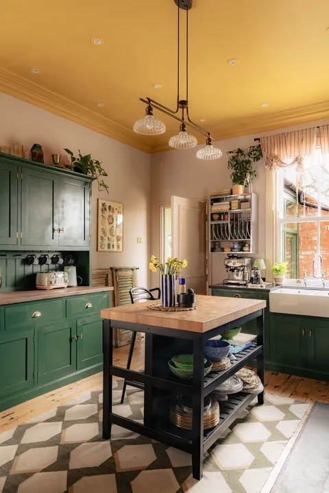 Kitchen with a bright yellow ceiling in a 1900s Victorian residence, Doncaster, South Yorkshire, England [711x1067]
